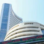 Bombay Stock Exchange (BSE) building in Mumbai with digital ticker showing Sensex and stock prices, representing Indian stock market trends.